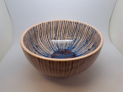 Ceramic light brown bowl with red and blue stripes