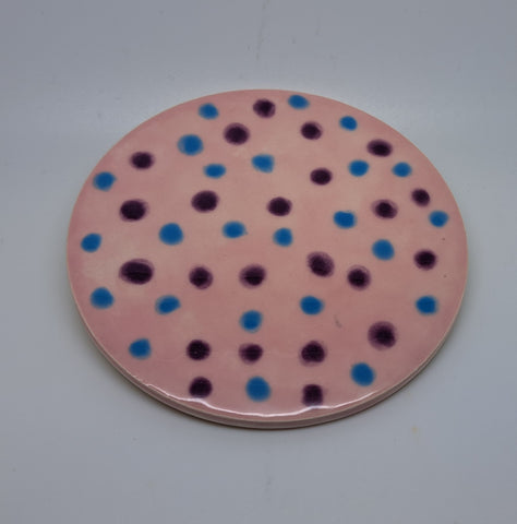 Ceramic round coaster with blue and purple spots