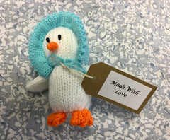 Knitted Duck In A Blue Bonnet